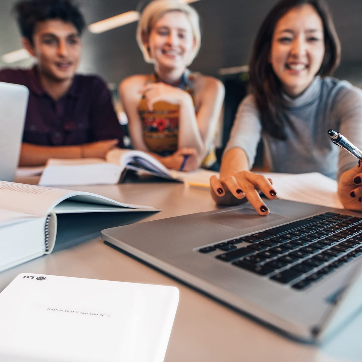 LG Electronics 8X USB 2.0 Super Multi Ultra Slim Portable DVD+/-RW External Drive with M-DISC Support, Retail (White) GP65NW60 White Drive