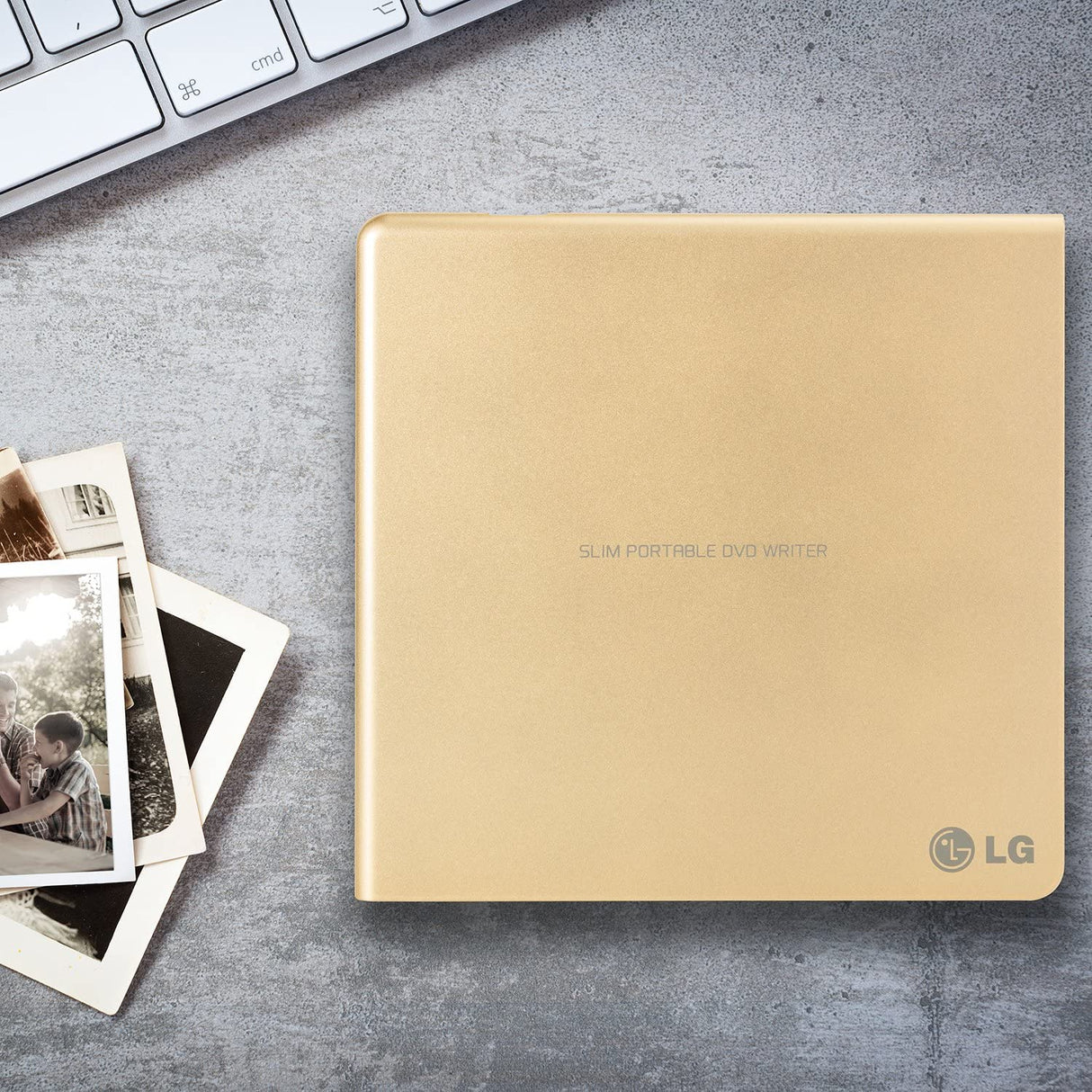 LG Electronics 8X USB 2.0 Super Multi Ultra Slim Portable DVD+/-RW External Drive with M-DISC Support, Retail (Gold) GP65NG60 Gold Drive