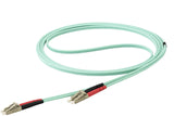 StarTech.com 7 m OM4 LC to LC Multimode Duplex Fiber Optic Patch Cable - Aqua - 50/125 - Fiber Optic Cable - 40/100Gb - LSZH (450FBLCLC7) 7m