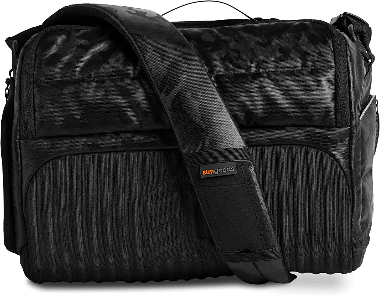 STM Dux 16L Premium Tech Messenger Bag - Carry On Travel Laptop Bag (Fits 15" Laptops) - Dual Format, Water Resistant &amp; Luggage Passthrough - Black Camo (stm-112-377P-04)